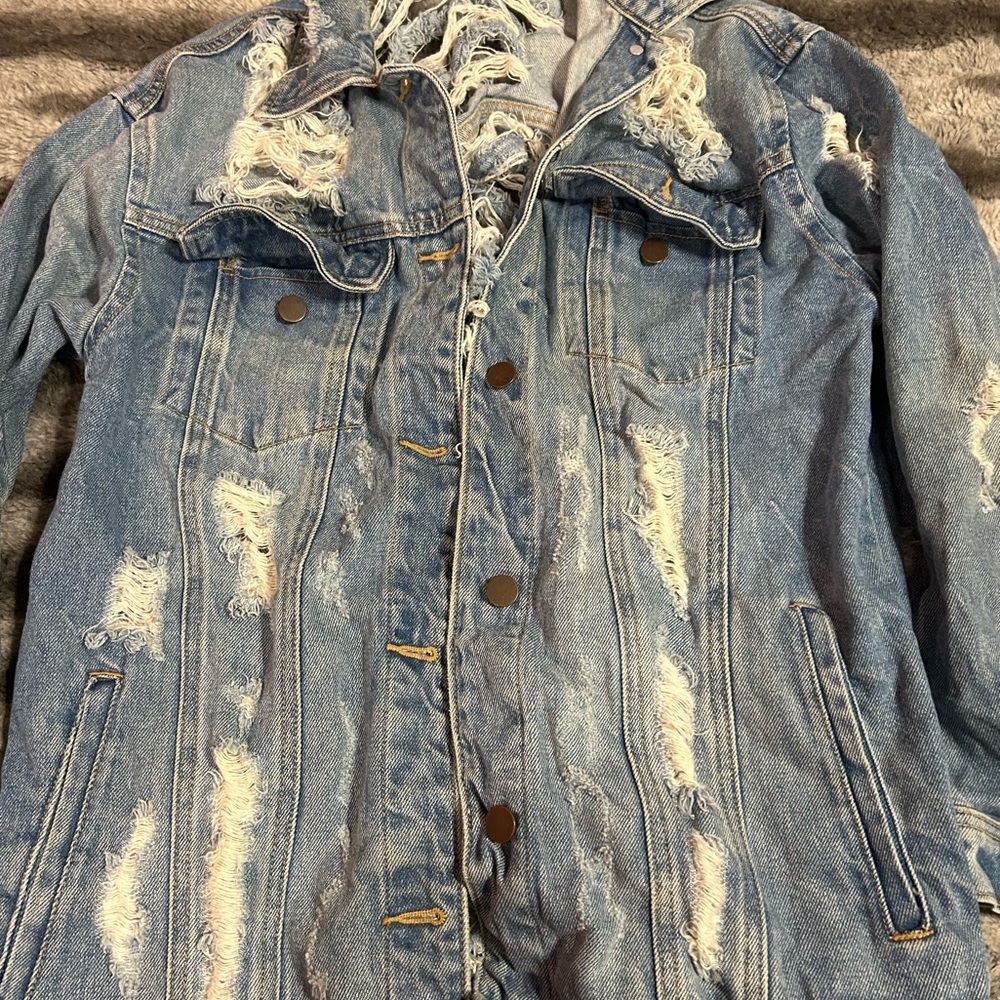 Ripped denim jacket
